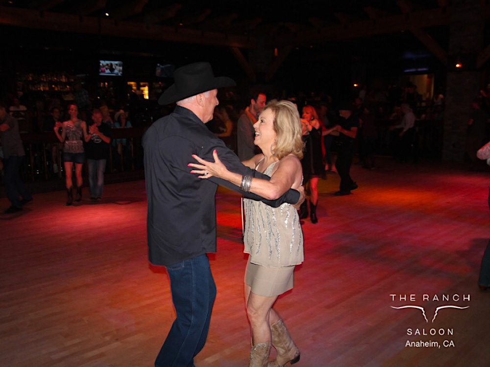 Andrew Edwards and his wife, Morgan, dancing the West Coast Swing at The RANCH Saloon.