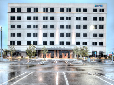 The outside view of the 6 story Extron building that houses THE RANCH Restaurant & Saloon.