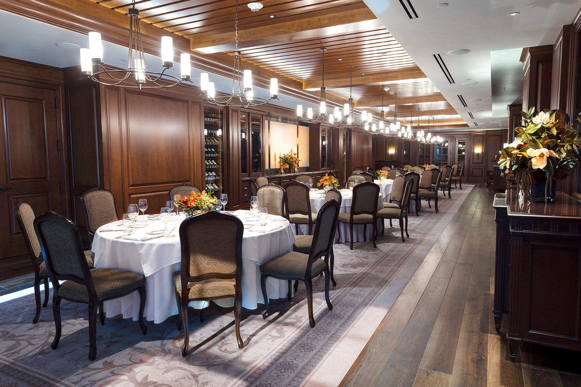 Ranch Dining Room With Gun Hanging From Wall