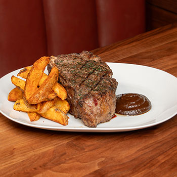 Expertly prepared and served with thoughtful accompaniments, our Bone-In New York Delmonico is a classic choice for a reason.