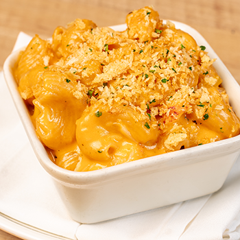 Silky Vermont White Cheddar, Tender Lobster and House-Made Pasta come together to create a sophisticated reimagining of a classic comfort dish