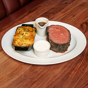Experience our luxurious Gold Canyon Premium Black Angus Prime Rib on your next visit to THE RANCH.